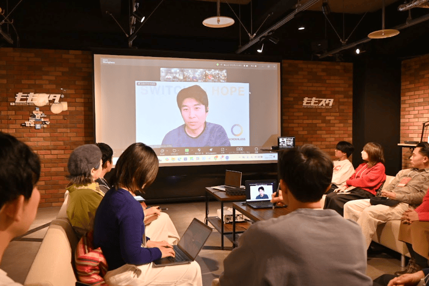 ビデオ通話で参加の田口氏の写真